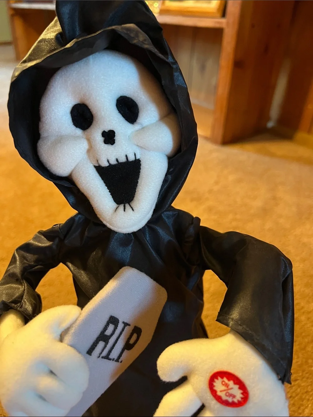Black Grim Reaper Animated Plush Figure with White Skull